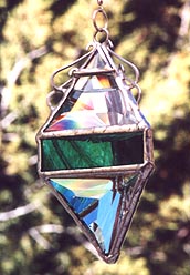 Teal accents enhance this beveled water prism.